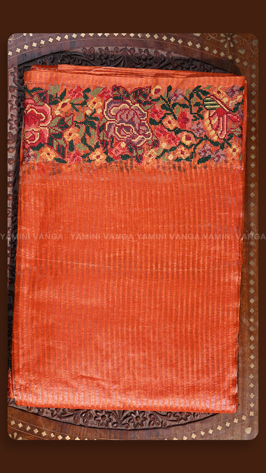 Vibrant Orange Silk Saree with Floral Embroidery